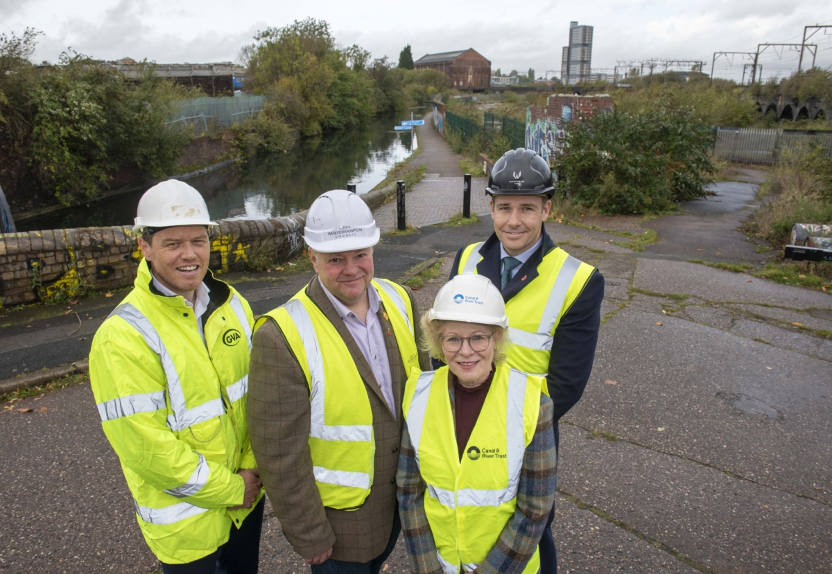 (L-R): Mark Birks, Principal and Head of Residential Birmingham at Avison Young, Cllr Stephen Simkins, City of Wolverhampton Council Leader, Cheryl Blount-Powell, National Property Development Manager at the Canal & River Trust, and James Dickens, Managing Director of Wavensmere Homes, with the Canalside South site to the right