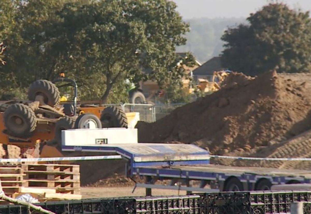 The overturned dumper on the Essex site. Picture courtesy of ITV News Anglia